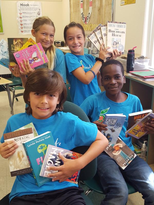 Ms. Van Loon&#039;s 5th grade class would like to thank the United Way for the opportunity to purchase high interest level books for our classroom library. This added much joy to the 5th graders at Poinciana Elementary!